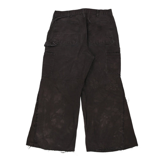 Vintage brown Heavily Worn Carhartt Carpenter Trousers - mens 32" waist
